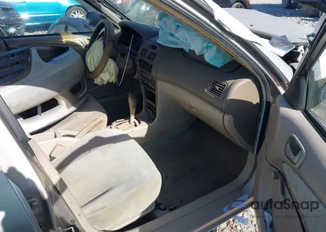 2001 Toyota Corolla Ce z USA, uszkodzony, nr VIN 1NXBR12E01Z561124